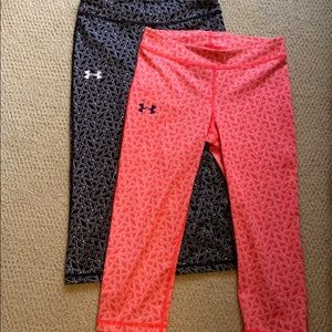 Two pairs of Under Armor capri leggings